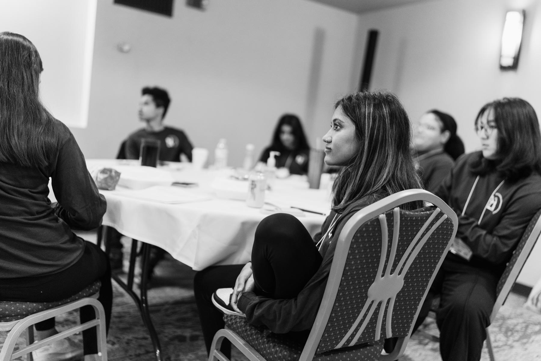 Students listening to a speaker.